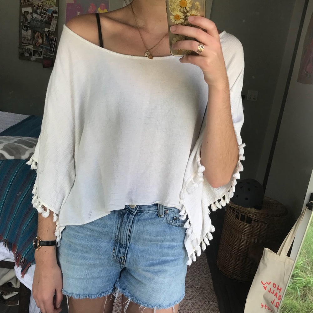 Cream Off-the-shoulder Top with tassel sleeves